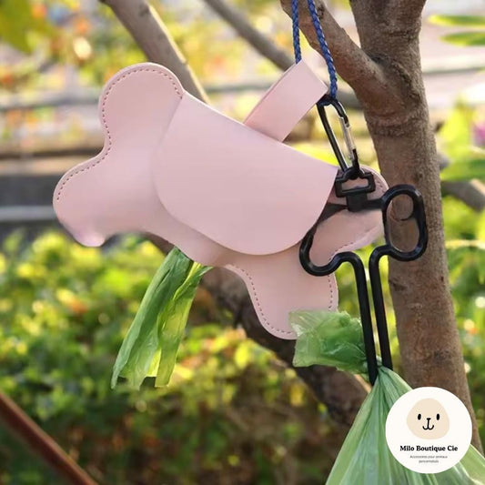 Distributeur de sac à a crotte en forme d'os